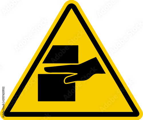 Yellow Warning Sign Illustrating Hand Crushing Hazard