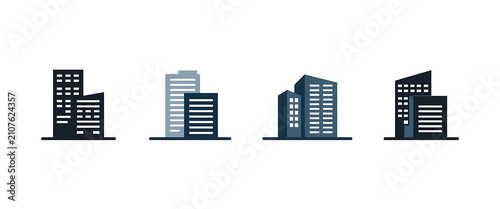 Four modern skyscraper building icons in shades of blue and grey suggesting urban architecture and city skylines.
