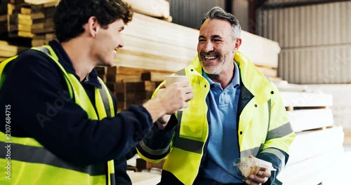 Fototapeta na wymiar Woodwork, cheers or happy people with coffee for lunch break or rest together in carpentry workshop. Men, carpenter or contractor with smile, food or drink for social discussion or toast in warehouse