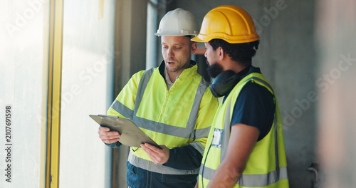 Obraz na płótnie Construction, clipboard or team with site inspection for building progress, compliance or update