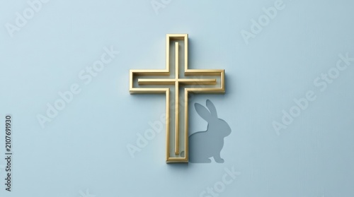 Golden christian cross with rabbit shadow on blue background