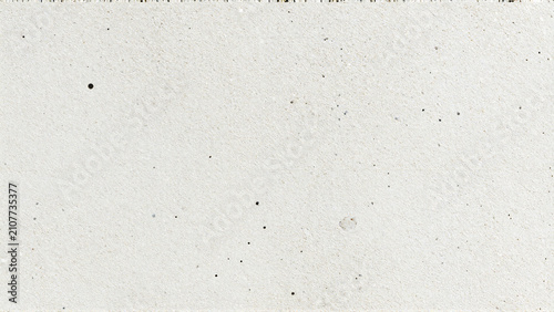 Minimalist Light Grey Concrete Wall Texture Background with Speckles
