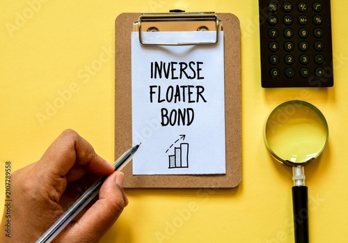 Inverse floater Bond inscription on paper on office desk background. Top view, investment concept.
