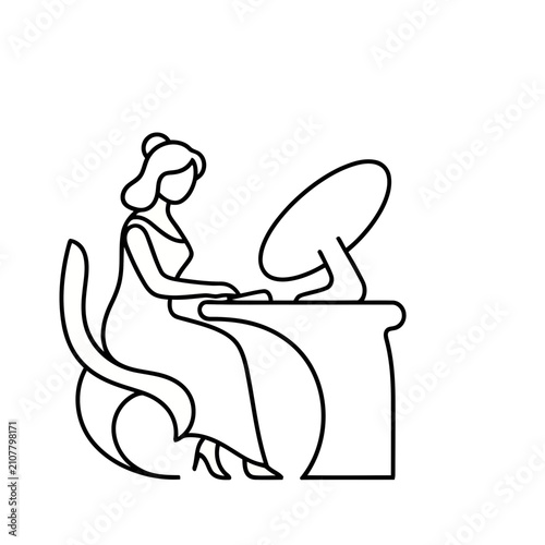 Woman working on a computer at a desk