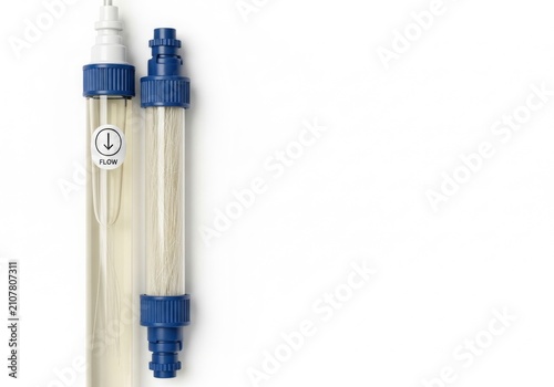 Two Transparent Water Filters with Blue Caps on a White Background.