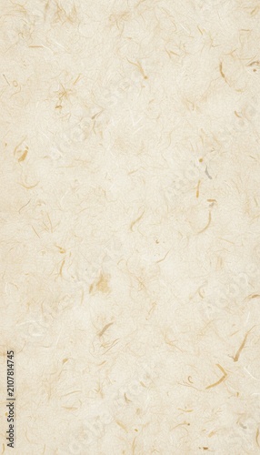 Organic handmade paper texture background. Beige craft paper with a natural fiber pattern.