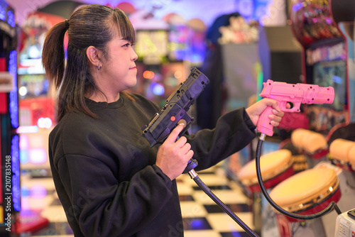 Cool Woman Dual Wielding Light Guns in Arcade Shooter