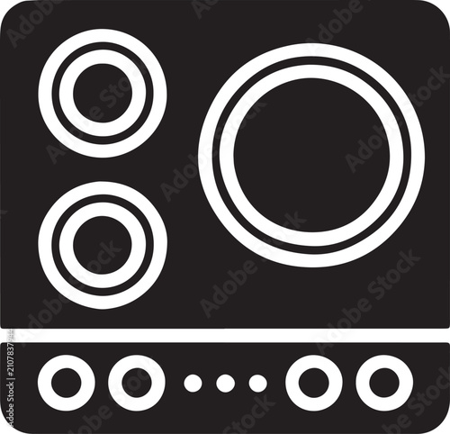 Kitchen stove top with induction heating elements and control buttons for professional cooking