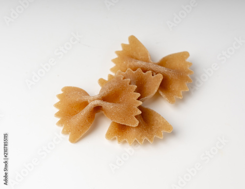 Принти на полотні Raw Brown Farfalle Pasta Isolated