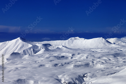 Snowy plateau and blue sky