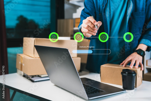 Person monitoring delivery progress with digital shipment tracking dashboard