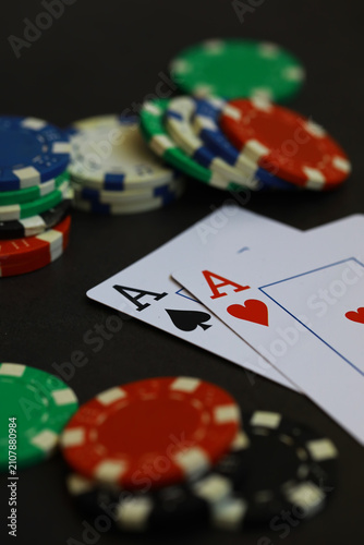 Fotografie Poker Night: Close-Up of Poker Chips and Playing Cards with Aces on Green Felt T