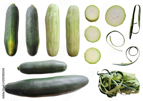 Bild auf Leinwand Young zucchini set, whole, peeled, sliced rounds and skin ribbons isolated on tr