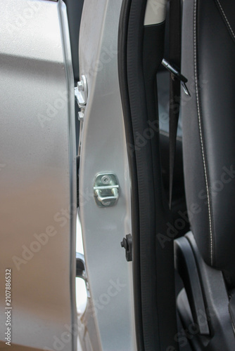 Portrait of a new car door lock latch