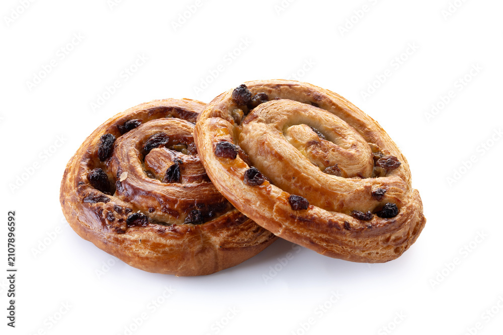 Fototapeta premium Raisin swirl pastries isolated on white background