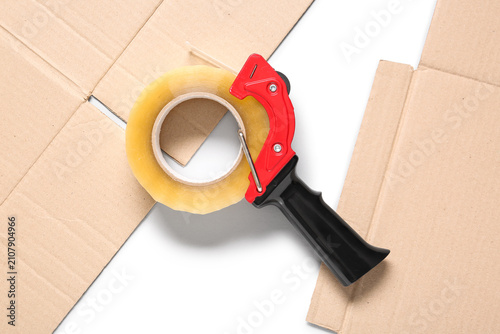 Packing tape dispenser with...