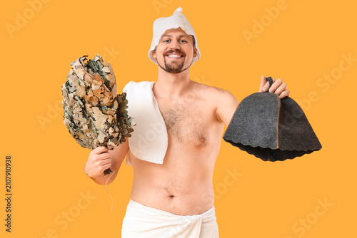 Handsome man with sauna whi...