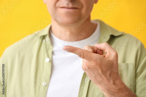 Mature man with contact len...