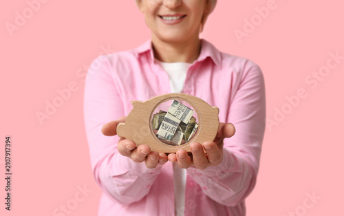 Mature woman with wooden pi...
