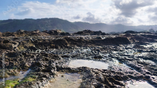 Low tide at a rocky beach. Kuta Beach, Lombok - Indonesia.