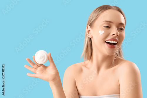 Pretty young woman with fac...