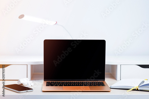 Cozy Remote Work Desk with Modern Lamp