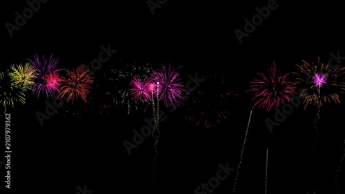Colorful glowing fireworks explosion for celebration background. fireworks celebration during a summer event. fireworks explosion overlay animation loop, Merry Christmas And Happy new year concept. 