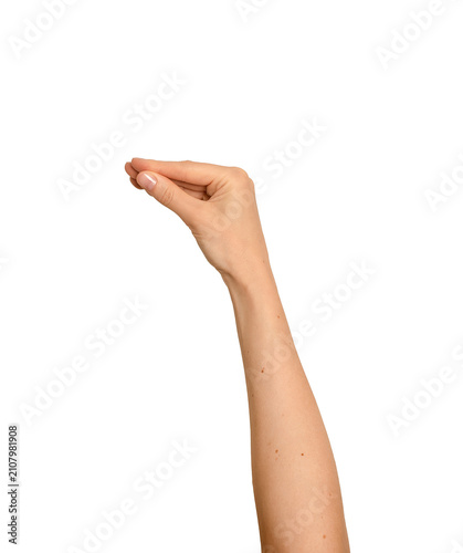 Hand raised with thumb and finger touching playfully. Woman s arm lifted in an expressive talking