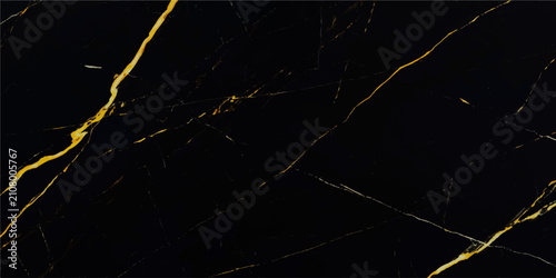 Black marble texture background featuring intricate gold veins for modern interior design projects