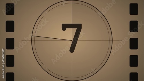 Vintage film countdown leader with sepia tones and film strip edges.
