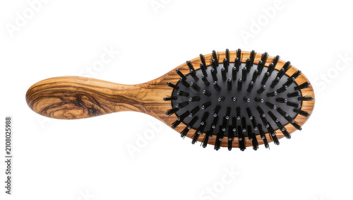 Obraz na plátně Oval olive wood hair brush with black bristles, isolated on transparent backgrou