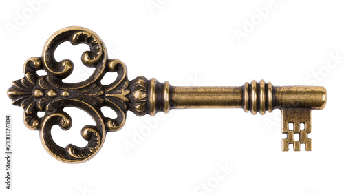 Antique ornate brass skeleton key with decorative scrollwork, isolated on transparent background