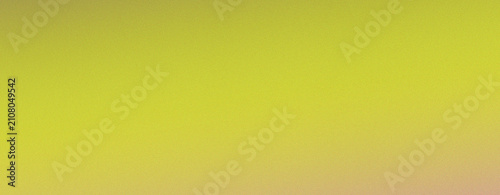 Fotografía Close-up of green grass texture with yellow and brown patches in sunlight