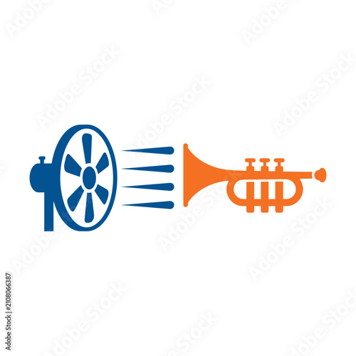 Фотография Fan blowing air toward a trumpet, symbolizing sound amplification or air flow in