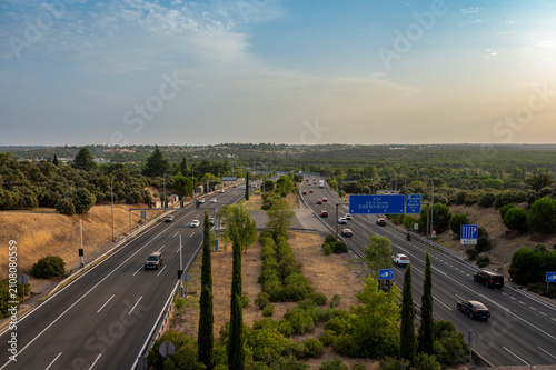 Cars driving on highway through countryside