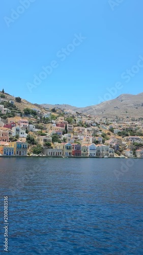 Panoramic view of the Mediterranean Sea, vibrant sapphire blue water, untouched coastline, calm atmosphere, bright summer sky, cinematic landscape