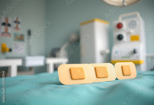 Three adhesive bandages wit...