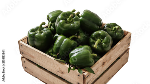 Fresh green bell peppers in a rustic wooden crate with natural lighting isolated on transparent background