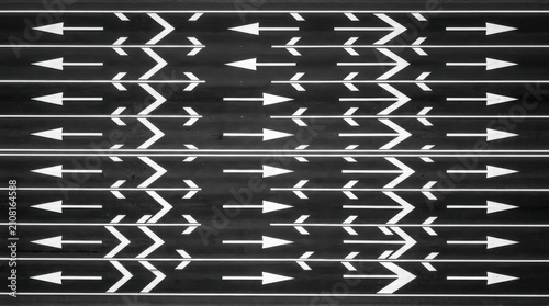Directional Arrows Markings On Asphalt Pavement Surface  Leading Forward Momentum