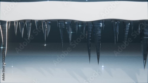 Dripping icicles releasing droplets falling from snow-covered roof eave, sunlight causing melting