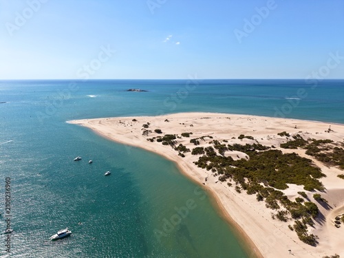 Fotografie aerial view of the wide sandy Playa de Camposoto between the Atlantic Ocean from