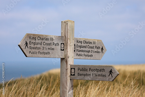signpost on the coast, King Charles 111 public Coastal Path signpost,