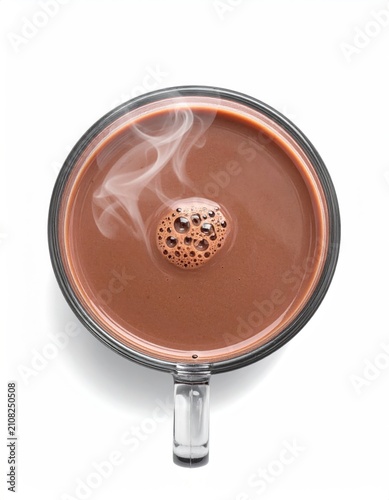 Overhead view of steaming hot chocolate in a clear glass mug