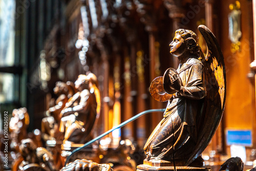 Carved Wooden Angel Musician inside Salisbury Cathedral in Salisbury, Wiltshire, England, UK