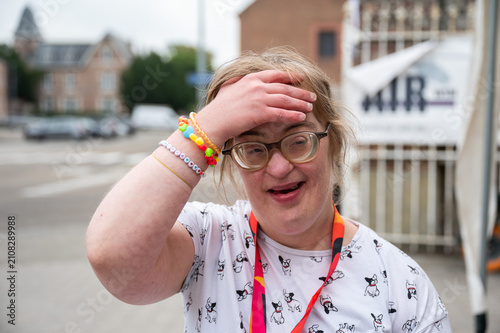 Portrait of a smiling woman with Down syndrome