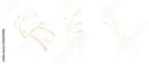 Set of transparent adhesive tape strips with realistic wrinkles and textures isolated on transparent background.