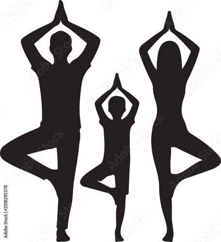 Silhouette of a family performing tree yoga pose