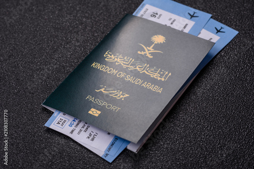 Saudi Arabia passport or id document with tickets for flight, travel. Saudi Arabia passport