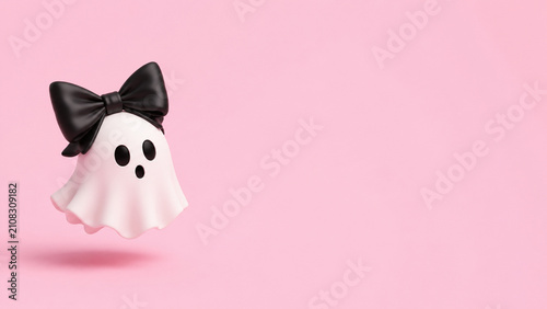 A cute white ghost wearing a large black bow floats against a pastel pink background.