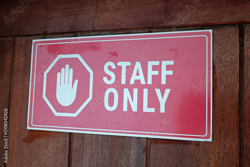 Close-up of a bright red sign with the inscription 